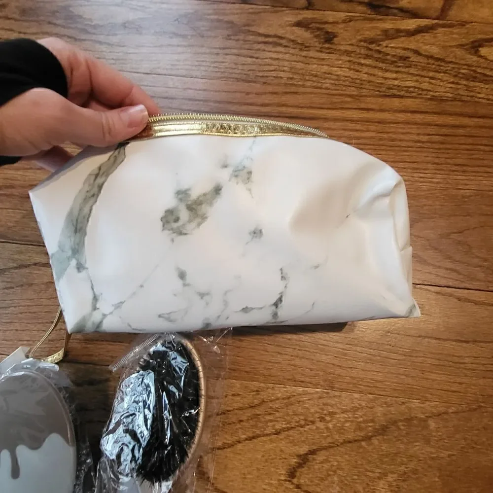 Cosmetic bag with wet brush and dry brush, hidden crown hair